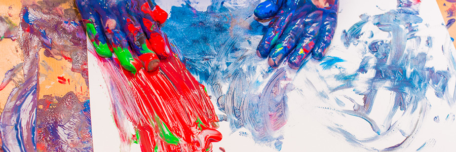Image of child's hands and fingerpainting