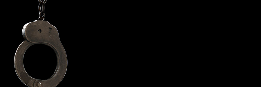 Image of a single steel handcuff
